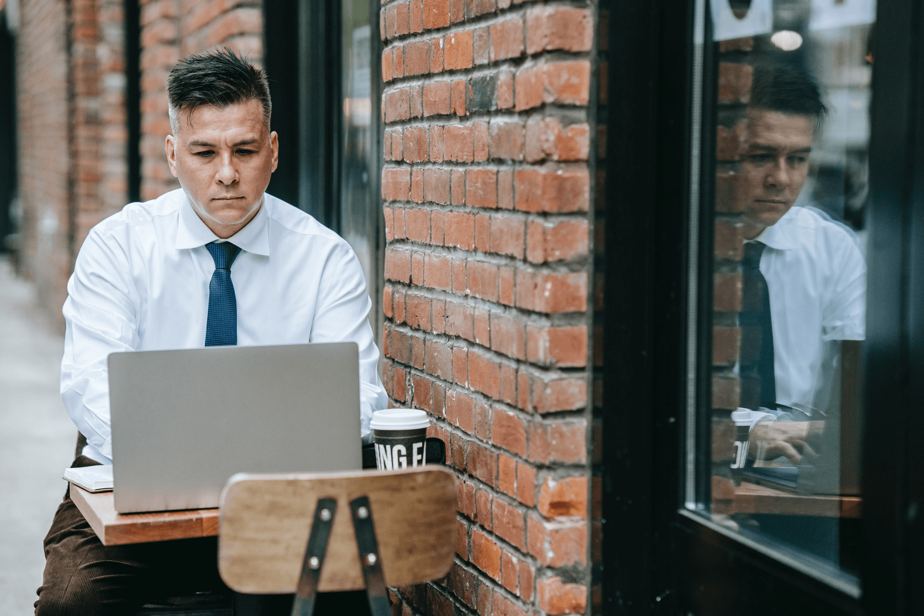 https://www.pexels.com/photo/black-woman-working-with-documents-in-office-5668879/