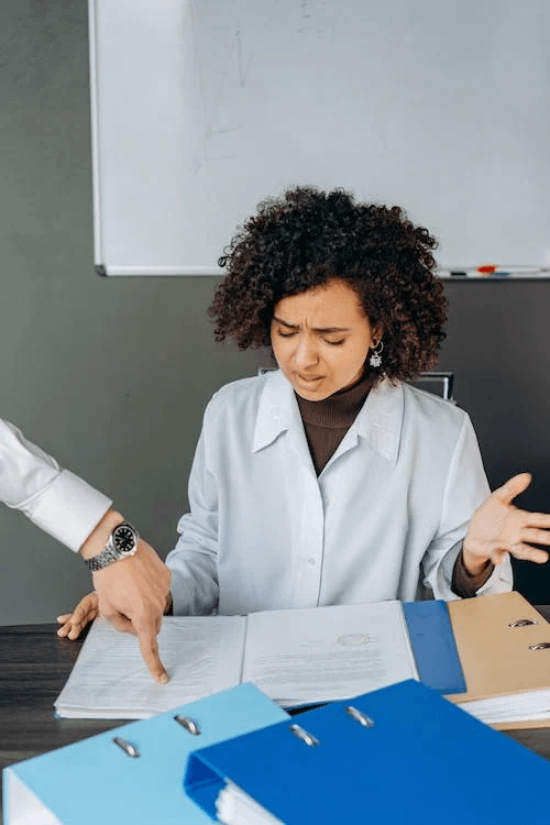 https://www.pexels.com/photo/young-woman-feeling-exhausted-in-white-long-sleeve-shirt-working-inside-an-office-8297420/