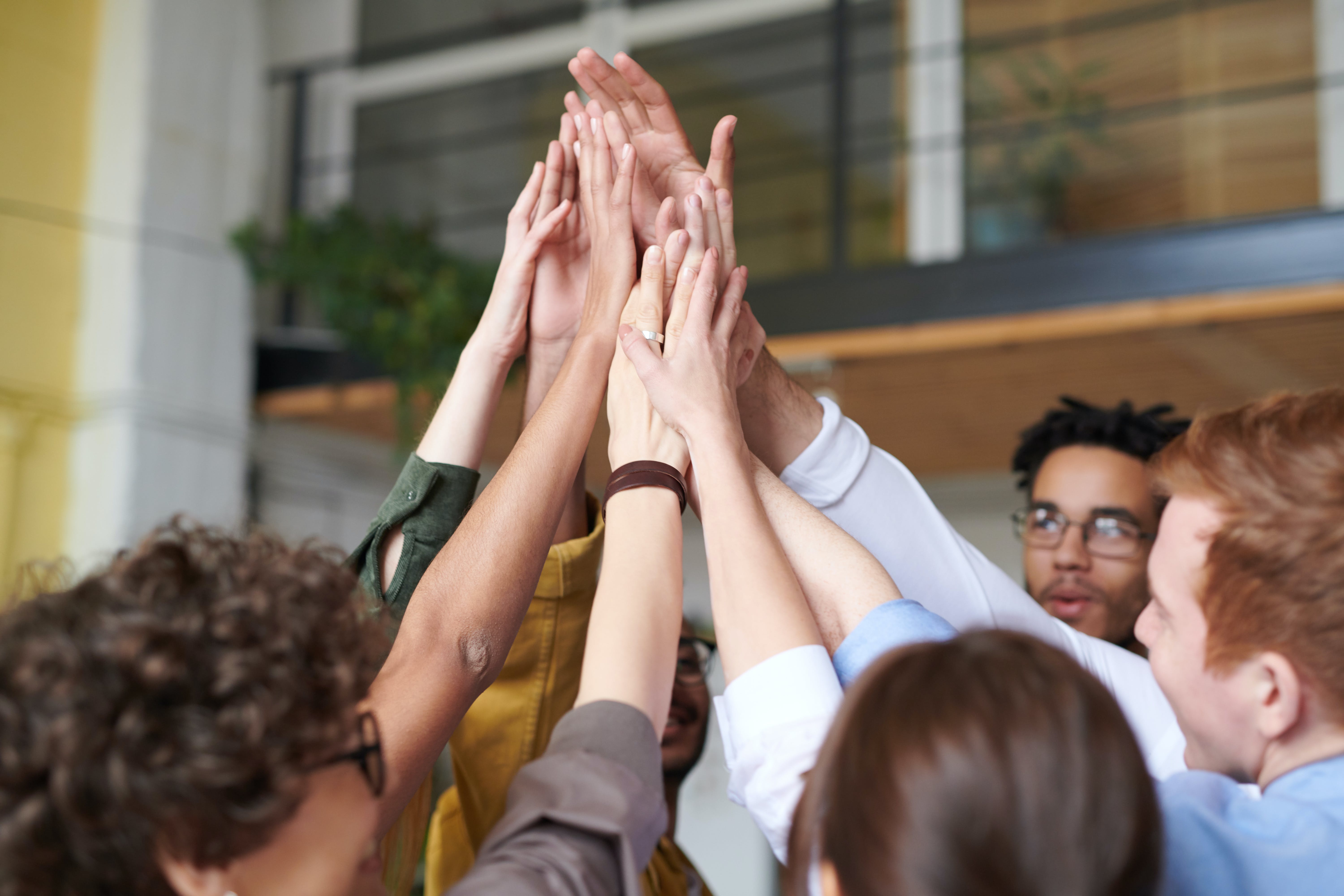 Free Photo Of People Touching Each Other's Hands Stock Photo