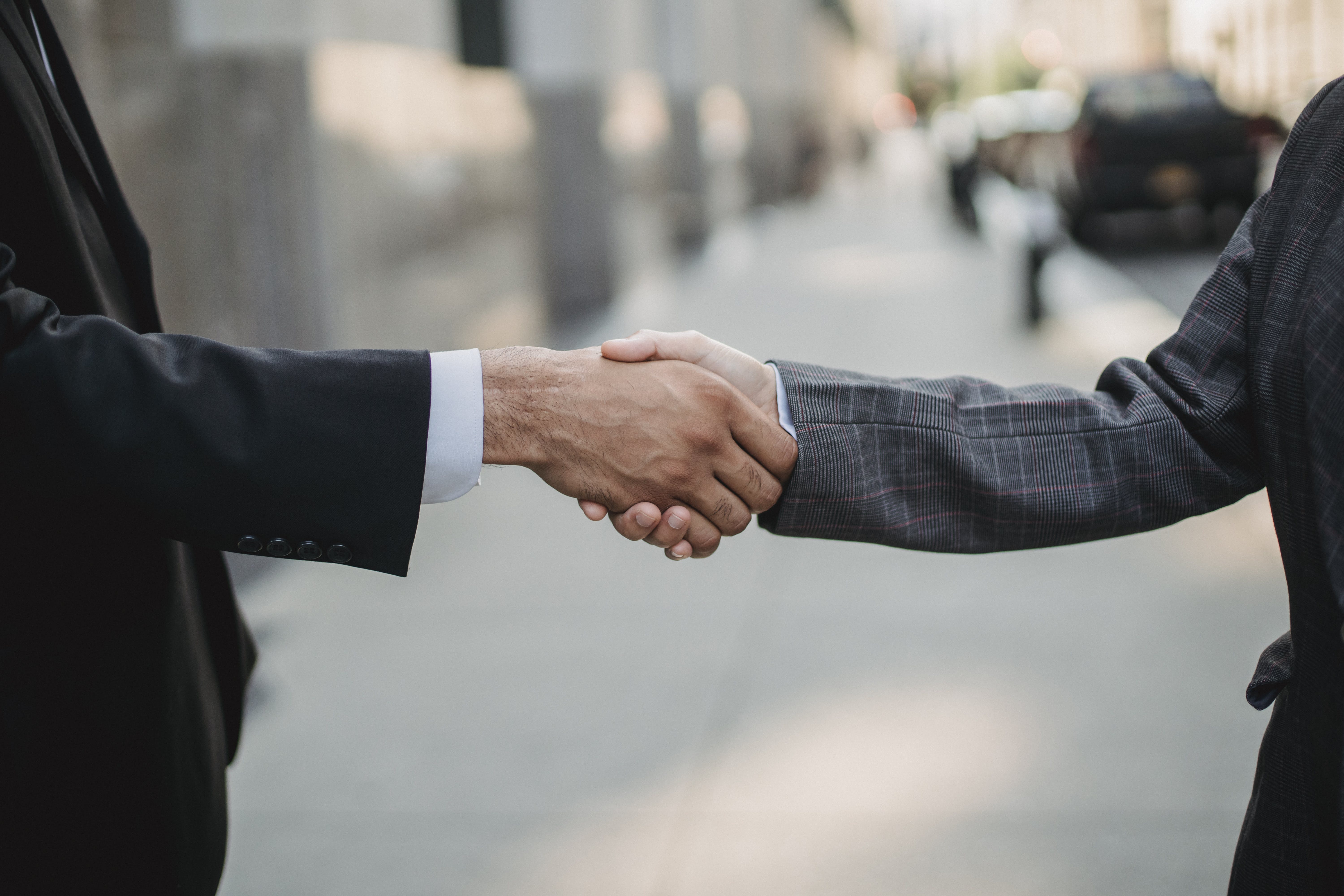 Free Close-up of Business People Shaking Hands Stock Photo